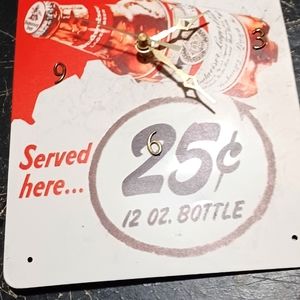 Budweiser clocks serve here$0.25 12 oz bottle 8x12